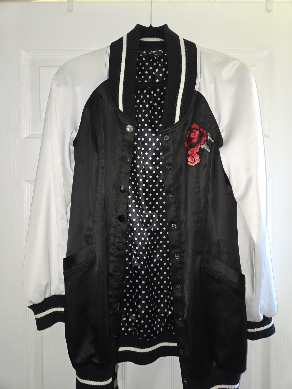 bebe Black Satin Varsity Jacket with White Sleeves and Red Rose